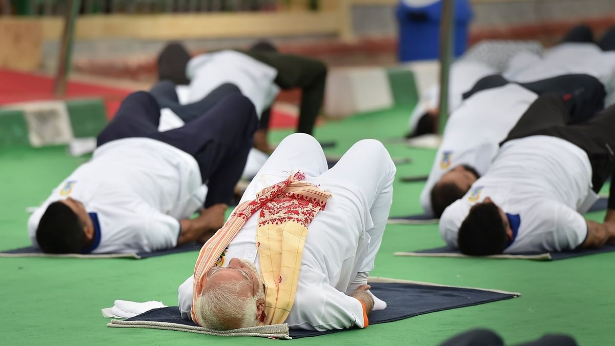 Highlighting that Yoga makes us conscious, competent and compassionate towards challenges, Modi said, millions of people with a common consciousness and consensus, millions of those with inner peace will create an environment of global peace, and that's how Yoga can connect the people, countries and it can become a problem solver for all of us. Credit: PTI Photo