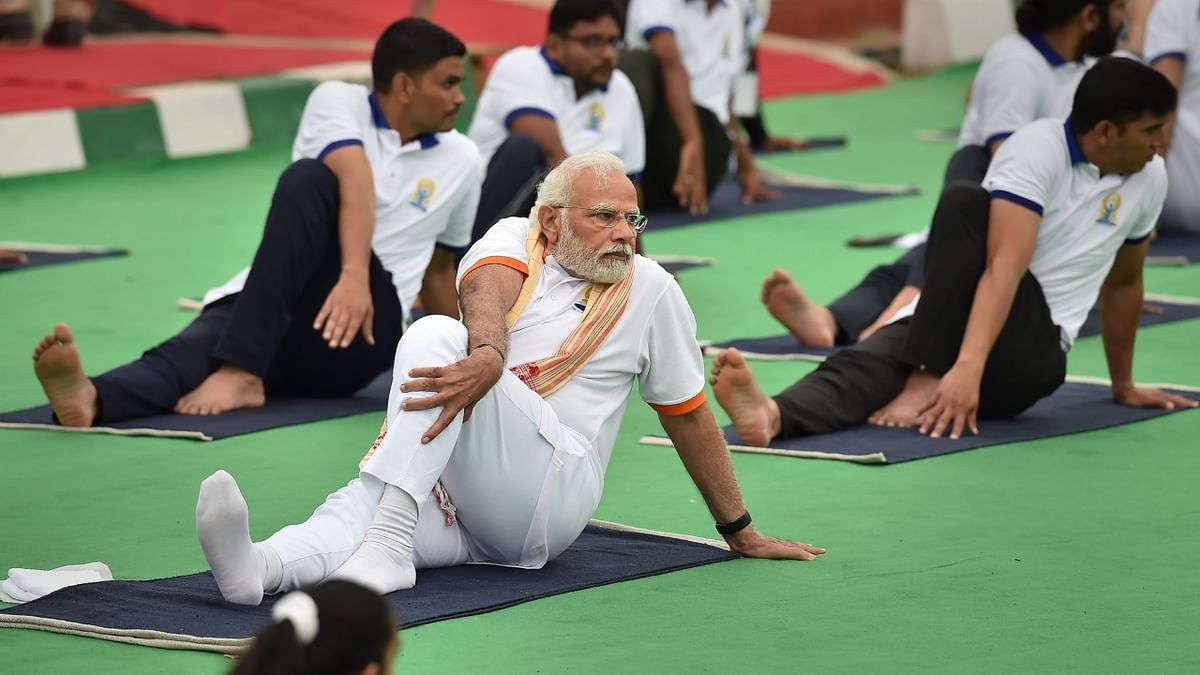 Noting that the Yoga Day is being celebrated as the country is observing 75 years of Independence, he said the broadness and acceptance for Yoga Day is an acceptance of India's feelings, which also gave energy for the nation's freedom struggle. Credit: PTI Photo