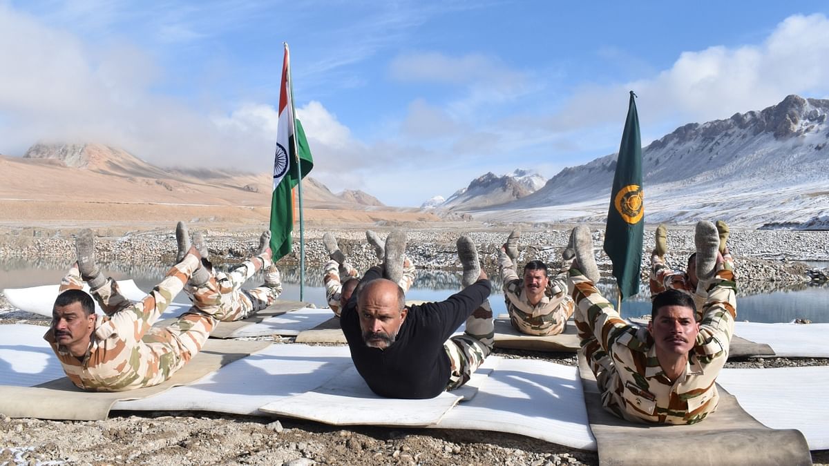 ITBP posted a few pictures on social media of 'Himveers' performing yoga in snow-capped Himalayas. Credit: Twitter/ITBP_official