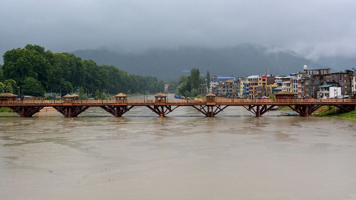 In Kashmir, the Jhelum crossed the danger mark at Sangam in Anantnag district and the water level was rising in other rivers also, officials said. Credit: PTI Photo
