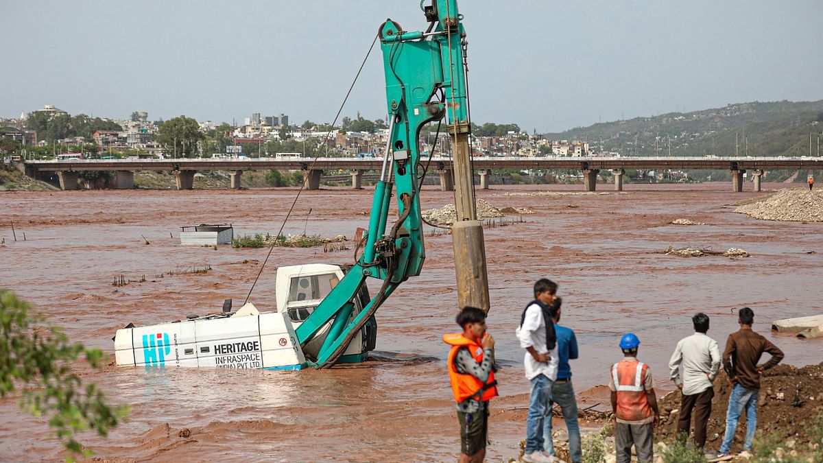 Vaishov stream, which flows mainly through Kulgam district, was flowing dangerously above the flood alert mark. However, the water level has started receding since 10 am, the officials said. Credit: PTI Photo