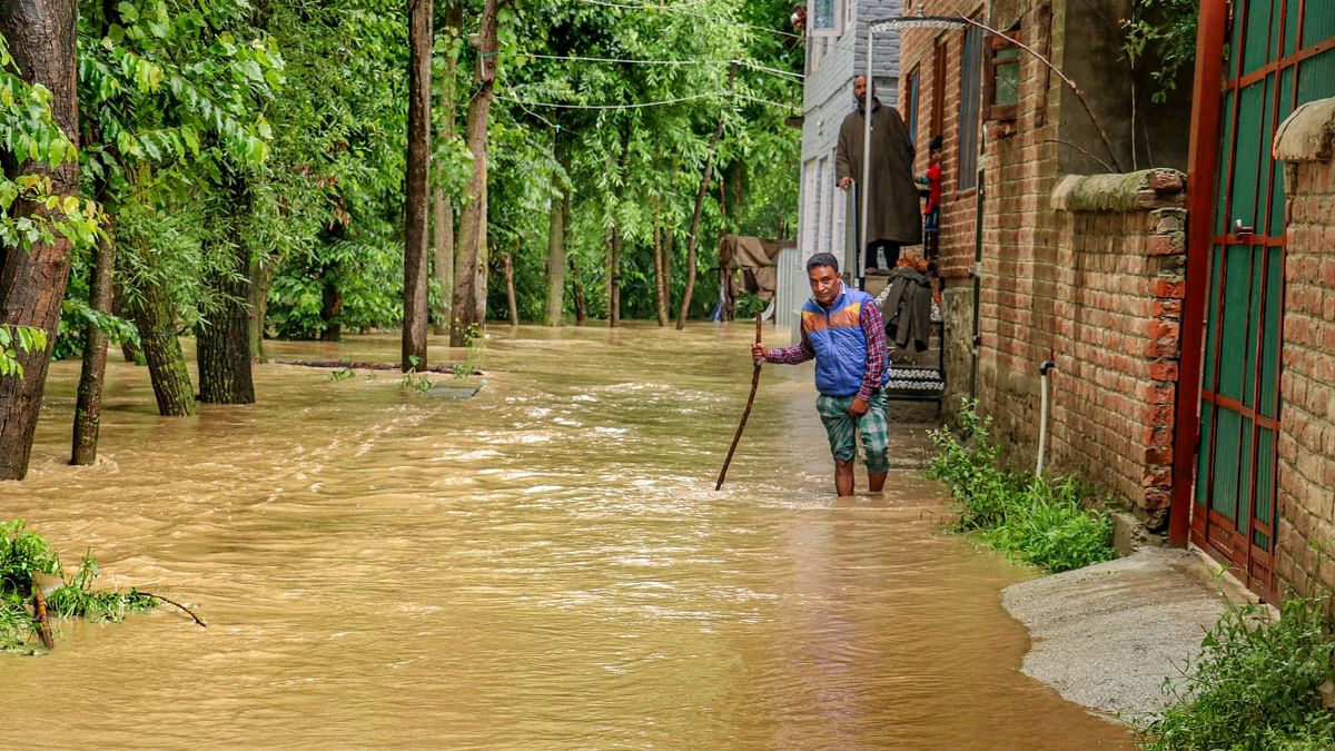 Many houses in Bemina, Rambagh and Rajbagh areas of the city were affected due to water-logging. Credit: PTI Photo