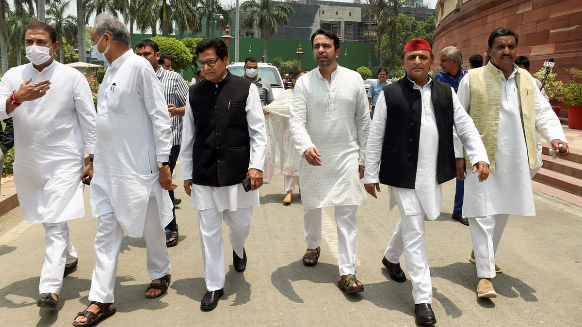 NCP leader Praful Patel, Rajasthan CM Ashok Gehlot, SP leaders Akhilesh Yadav & Ram Gopal Yadav and Rashtriya Lok Dal leader Jayant Chaudhary leave Parliament House  after attending Yashwant Sinha's nomination filing. Credit: PTI Photo
