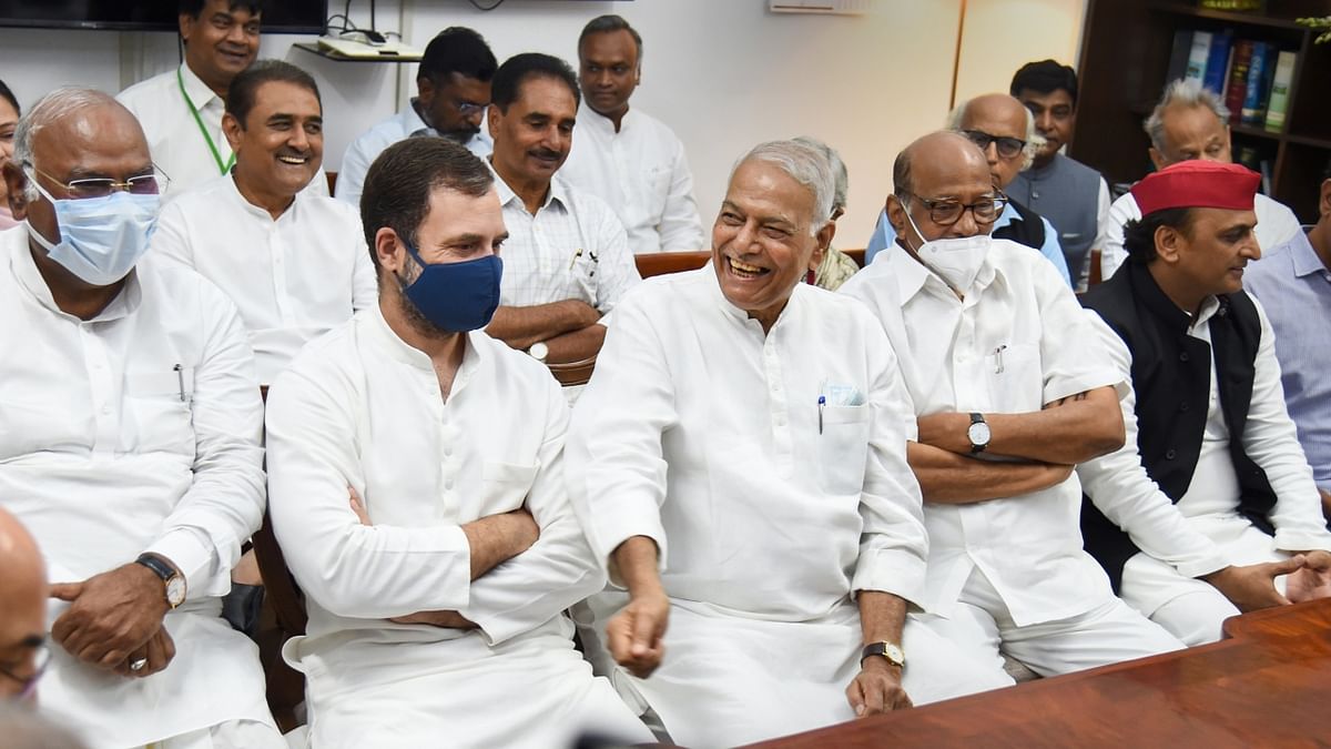 Opposition candidate Yashwant Sinha is seen sharing a lighter moment with his supporters during the filing of his nomination papers for the presidential election, at Parliament House in New Delhi. Credit: PTI Photo