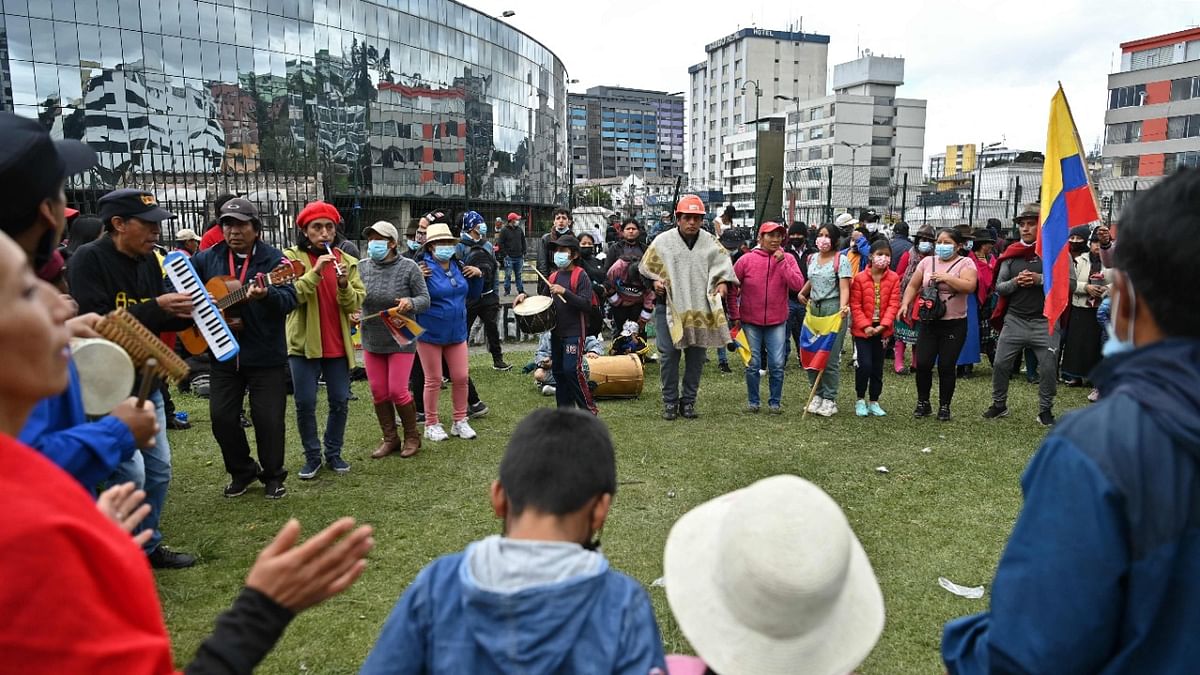 Indigenous people dance outside the Culture House near the National Assembly building in Quito on June 26, 2022, in the framework of indigenous-led protests against the government. Credit: AFP Photo