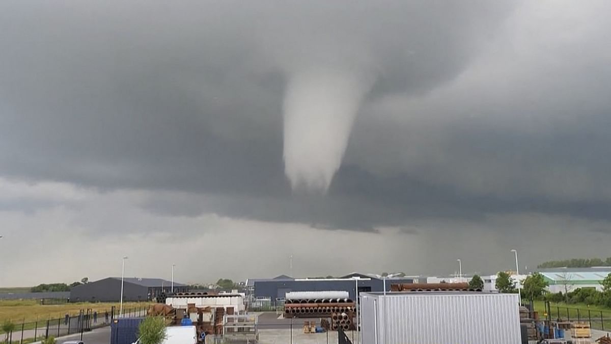 This video grab taken from a footage courtesy of Julian Steenbakke shows a tornado on June 27, 2022 in Zierikzee, Netherlands. - A tornado killed at least one person and injuring 10 others in the first fatal twister to hit the Netherlands for three decades. Credit: AFP Photo