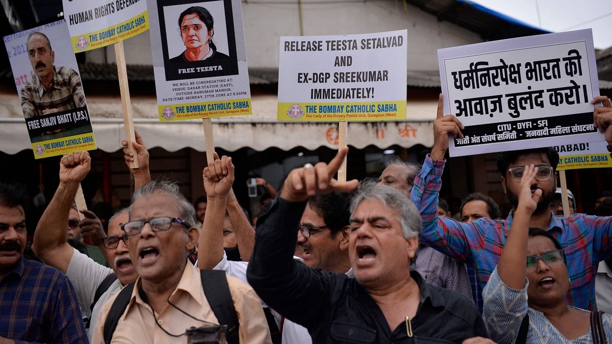 People shout slogans as they stage a protest against the arrest of activist Teesta Setalvad in Mumbai. Credit: AFP Photo
