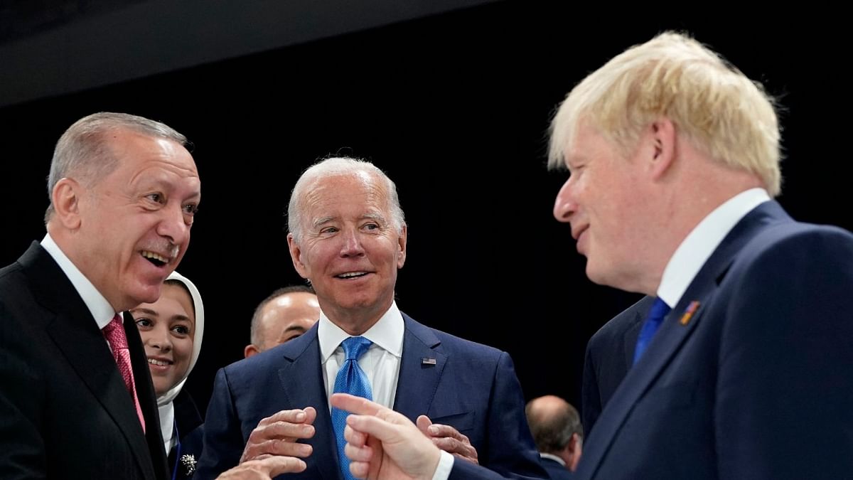 (From left) Turkish President Recep Tayyip Erdogan, US President Joe Biden, and British Prime Minister Boris Johnson speak before the first plenary session of the NATO summit at the Ifema congress centre in Madrid. Credit: AFP Photo