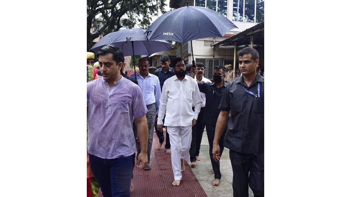 Hailing from a Maratha family in Satara, Shinde had humble beginning as an autorickshaw driver. He eventually moved to Thane, where he started his political journey. Credit: PTI Photo