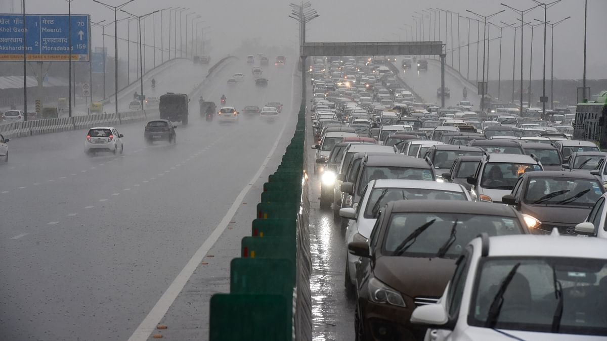 However, the downpour brought the familiar sight of traffic jams and waterlogging across the city. Credit: PTI Photo