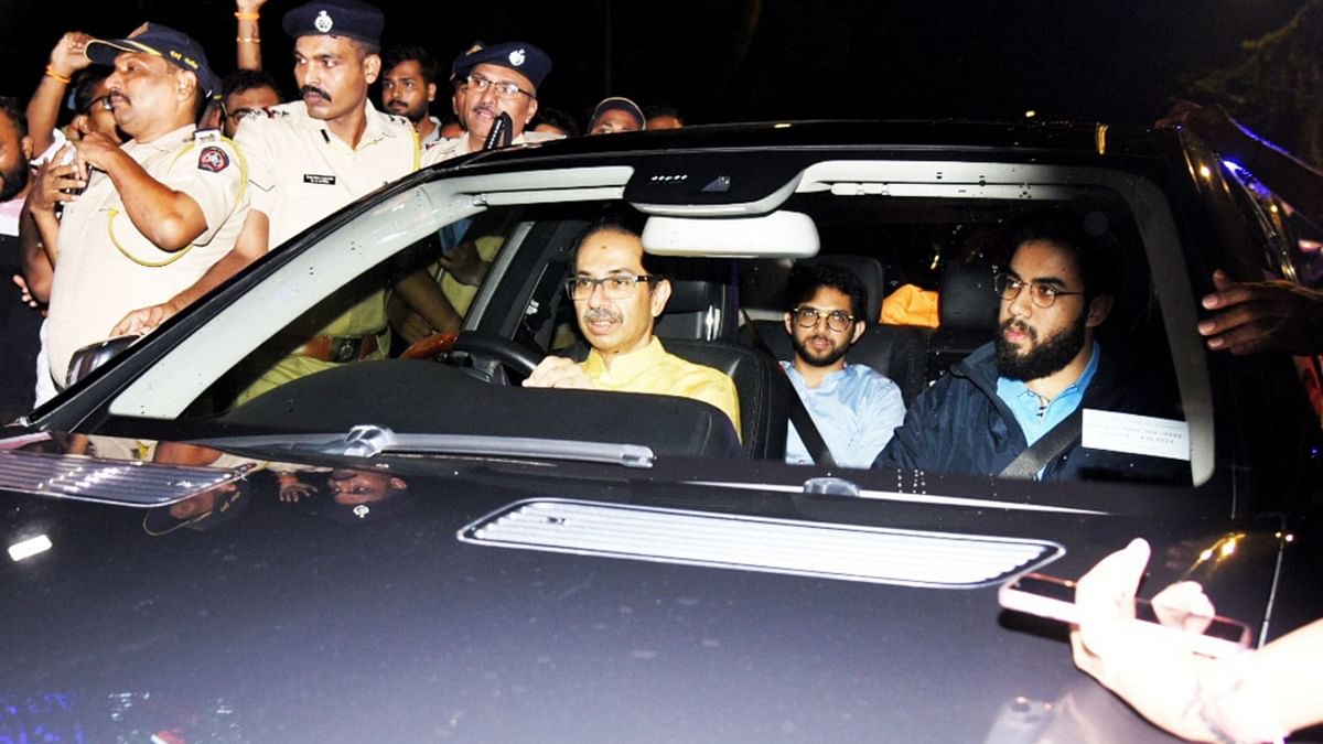 Uddhav himself drove the vehicle to the Raj Bhavan. He was accompanied by his wife Rashmi, and son Aditya Thackeray. Credit: PTI Photo