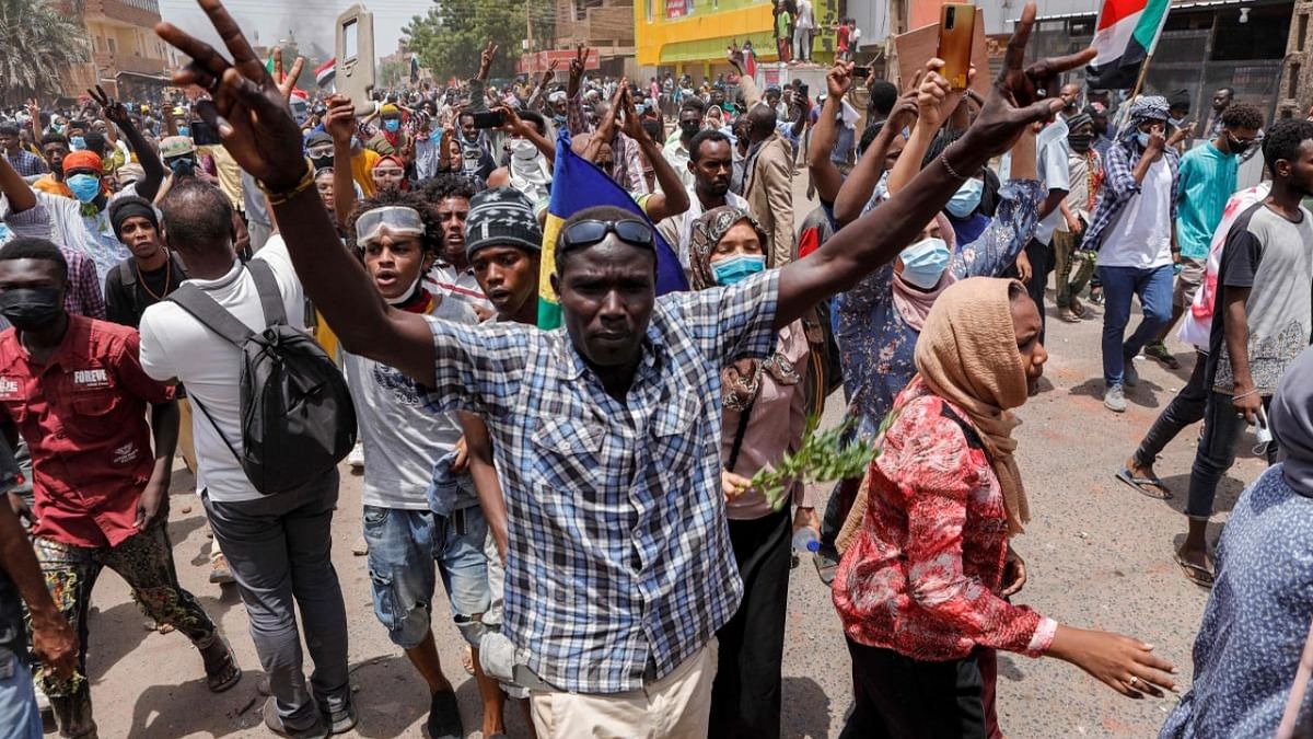 Anti-coup protesters chant slogans as they march during mass demonstrations against military rule in the centre of Sudan's capital Khartoum on June 30, 2022. Credit: AFP Photo