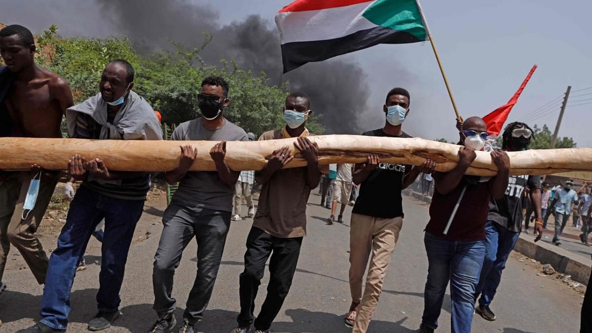Sudanese anti-coup protesters take part in a demonstration against military rule, in Khartoum on June 30, 2022. Credit: AFP
