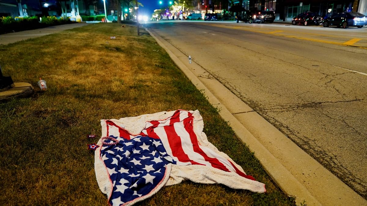 A gunman on a rooftop opened fire on an Independence Day parade in suburban Chicago, killing at least six people, wounding at least 30 and sending hundreds of marchers, parents with strollers and children on bicycles fleeing in terror. Credit: Reuters Photo