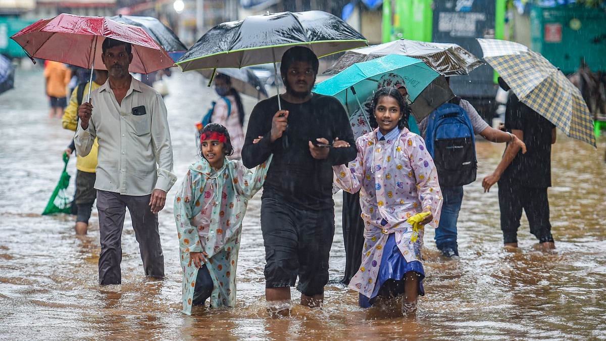 Mumbai and its adjoining areas witnessed heavy showers, resulting in waterlogging at several places. Credit: PTI Photo