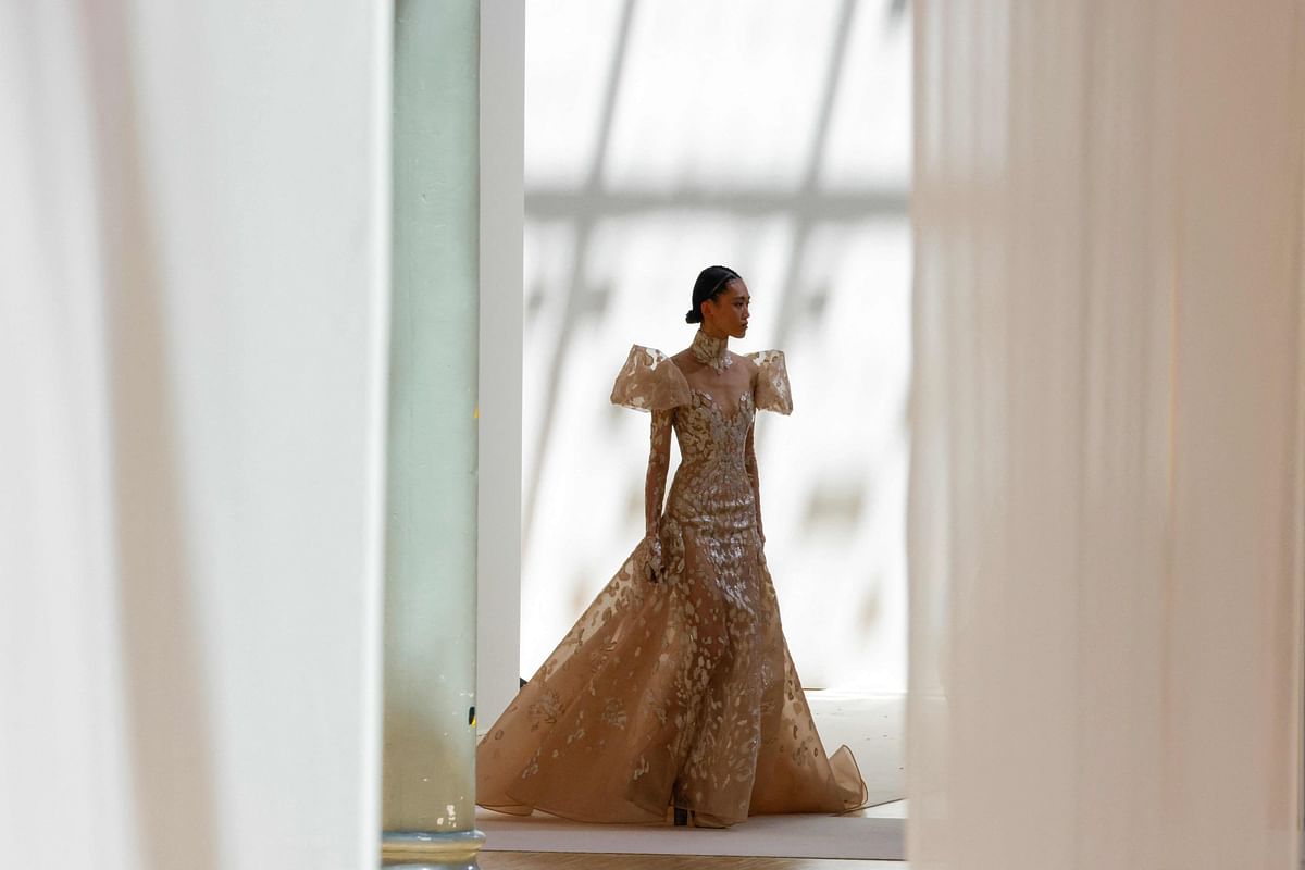 A model presents a creation for Elie Saab Women's as part of the Women's Haute-Couture Fall - Winter 2023 Fashion Week in Paris. Credit: AFP Photo