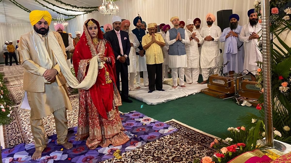 The regular 'band, bajaa, baraat' were missing but the festivities seemed intact as Punjab Chief Minister Bhagwant Mann turned groom for his wedding with a doctor from Kurukshetra at his home in Chandigarh. Credit: Twitter/raghav_chadha