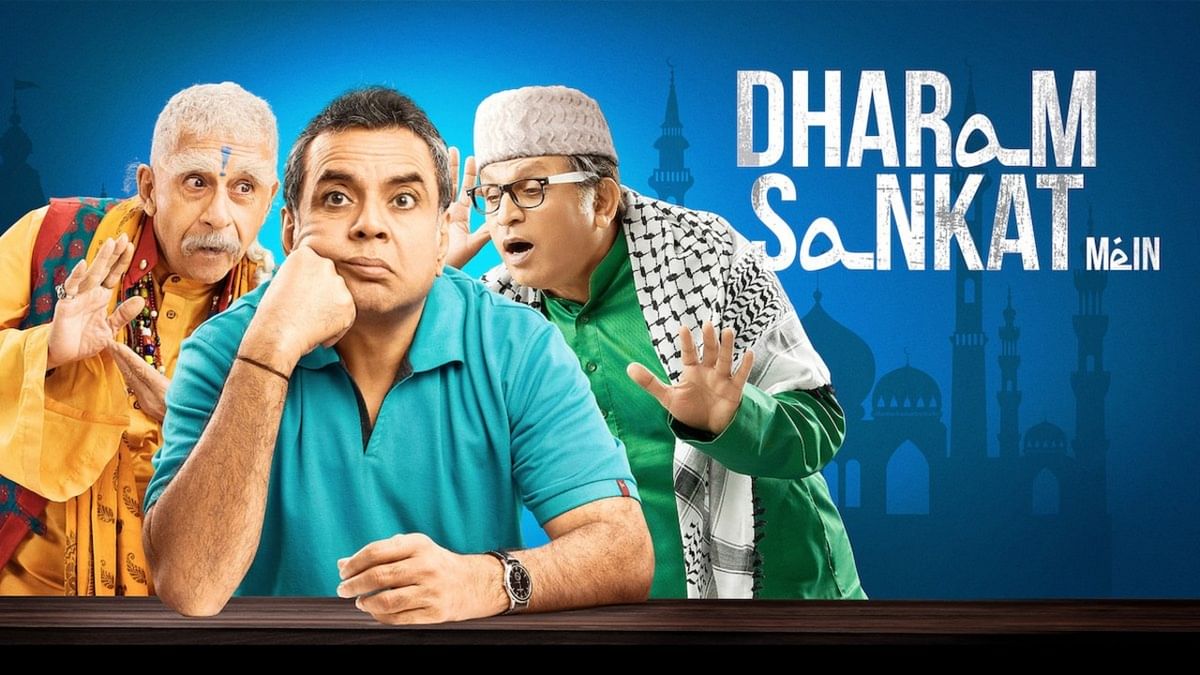 Dharam Sankat Mein | Bollywood film featuring Naseeruddin Shah, Paresh Rawal, and Annu Kapoor created a stir as on one of the posters Annu Kapoor was seen wearing a cap that resembles a Muslim cap or a 'taqiyah,' and in a certain section of the Muslim community raised objection to it. Credit: Special Arrangement