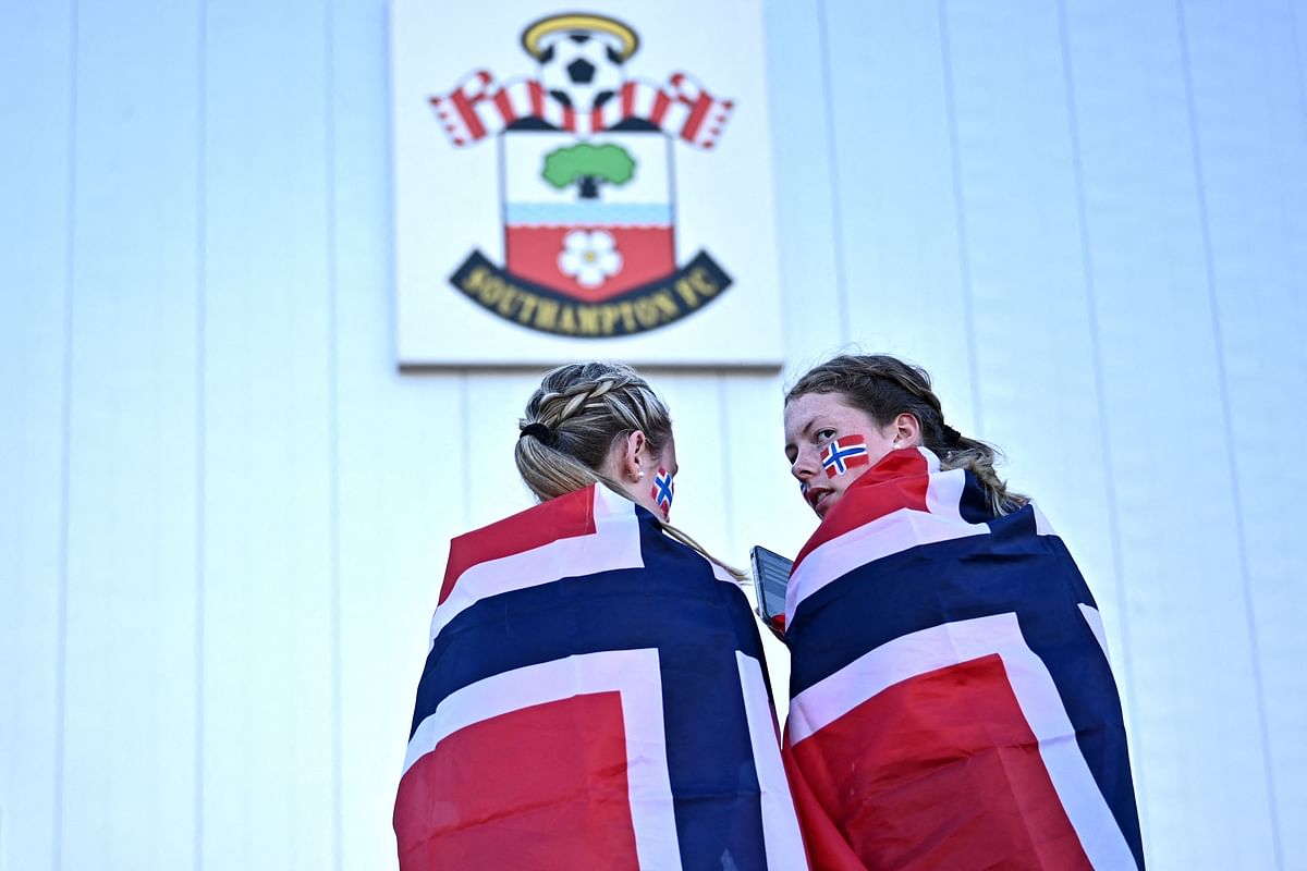 Norway fans wait outside the stadium ahead of the UEFA Women's Euro 2022 Group A football match between Norway and Northern Ireland at St Mary's Stadium in Southampton. Credit: AFP Photo