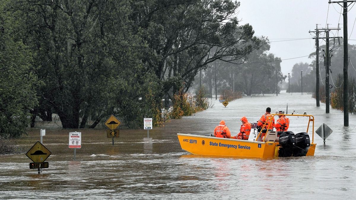 Emergency response teams made 100 rescues overnight of people trapped in cars on flooded roads or in inundated homes in the Sydney area, State Emergency Service manager Ashley Sullivan said. Credit: AP Photo