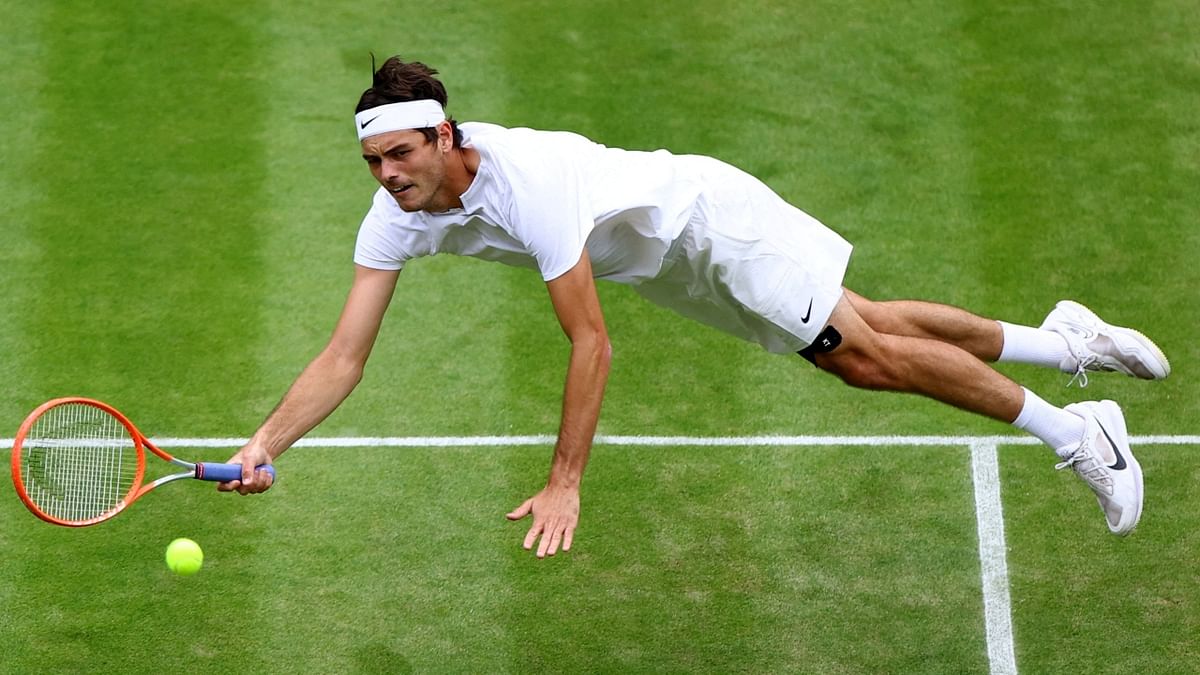 American Taylor Fritz made it to his maiden Grand Slam quarterfinal with a classy fourth-round victory against Australian qualifier Jason Kubler at Wimbledon 2022. Credit: Reuters Photo