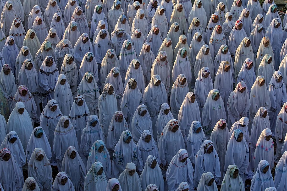 Indonesian Muslims offer Eid al-Adha prayers at Al Ikhlas Mosque in Madura, East Java province, Indonesia. Credit: AFP Photo