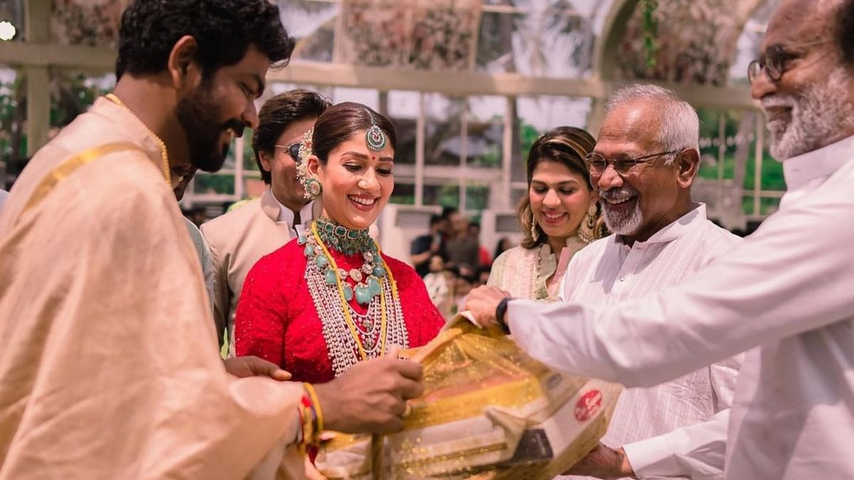 Mani Ratnam and Rajinikanth bless the couple on their wedding day. Credit: Instagram/wikkiofficial