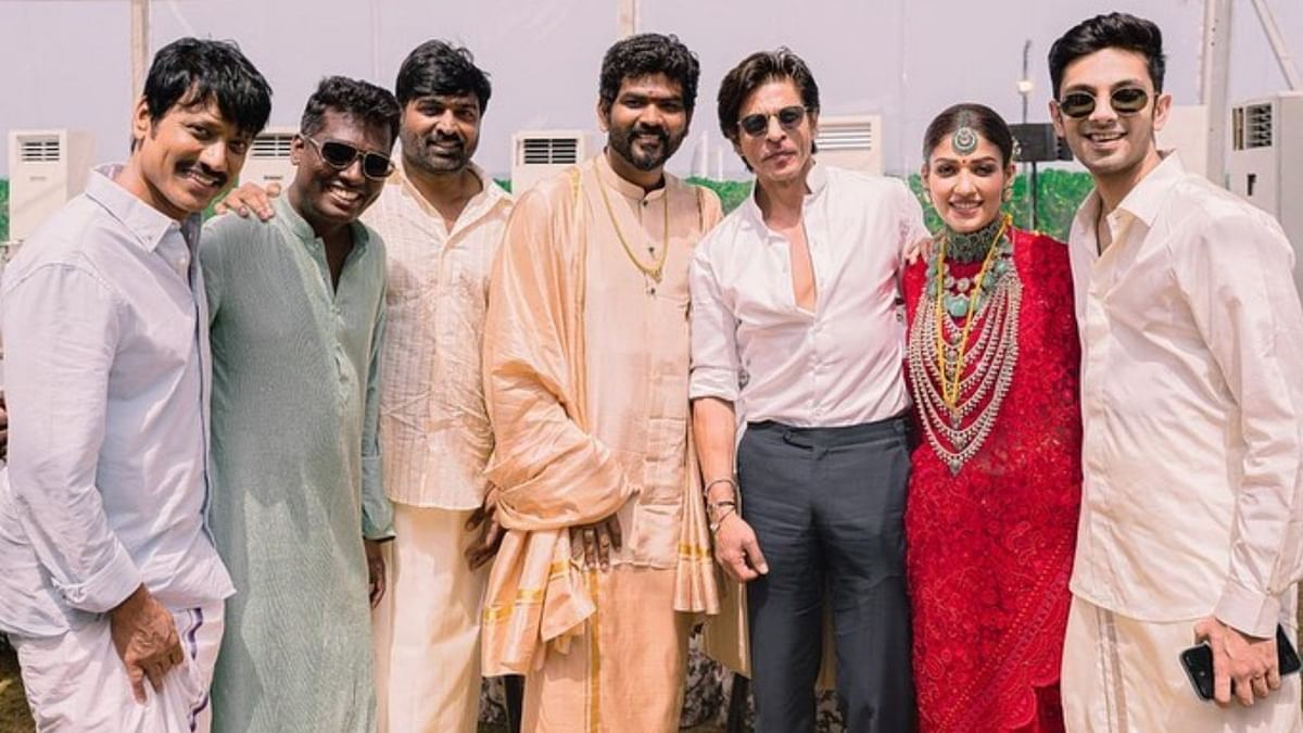 Vignesh Shivan and Nayanthara pose with their friends. Credit: Instagram/wikkiofficial