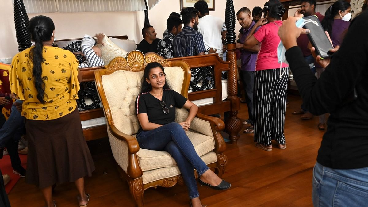 People crowd inside the Sri Lanka's presidential palace, in Colombo. Credit: AFP Photo