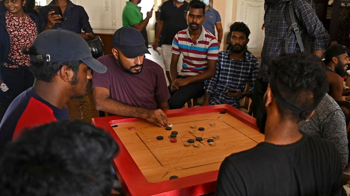 People play carrom inside the official residence of Sri Lanka's Prime Minister, in Colombo. Credit: AFP Photo
