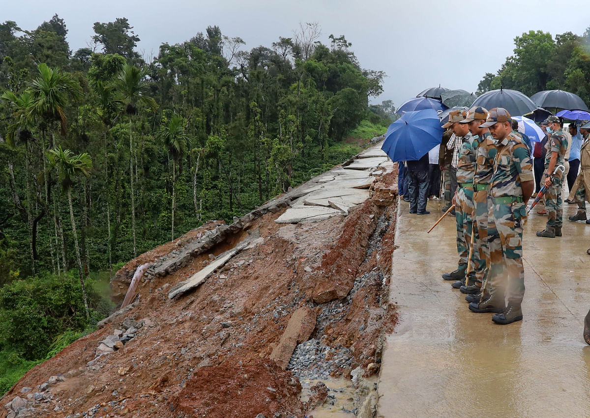 Dakshina Kannada: Security personnel at the spot after a landside due to heavy rainfall, in Dakshina Kannada district. Credit: PTI Photo