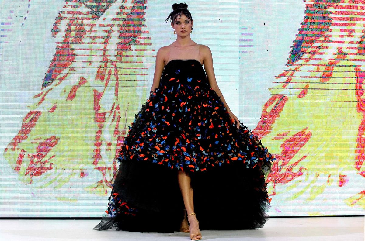 A model presents a creation from the fall-winter collection of designer Ivan Avalos, during the third and final day of the 77th edition of Intermoda in Guadalajara, Jalisco state, Mexico.