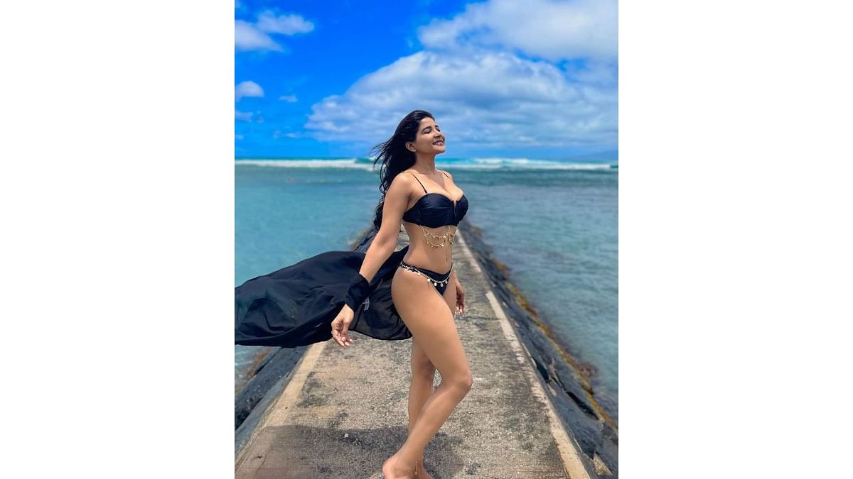 In the shared pictures, Sakshi was seen in a bikini, enjoying the sun, sand and beach. Credit: Instagram/iamsakshiagarwal