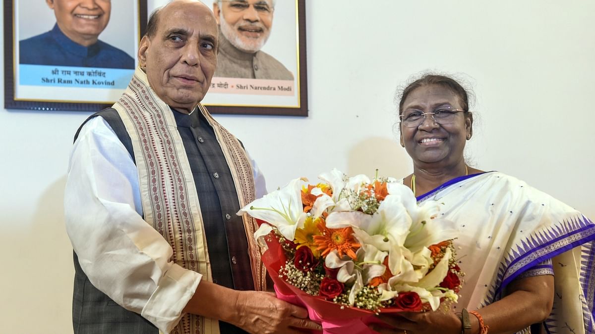 Defence Minister Rajnath Singh also visited Murmu to congratulate on her win. Credit: PTI Photo