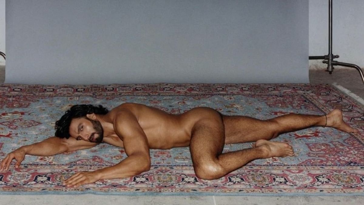 Inspired by Burt Reynolds, Ranveer is seen posing on a Turkish rug in his birthday suit. Credit: Paper Magazine