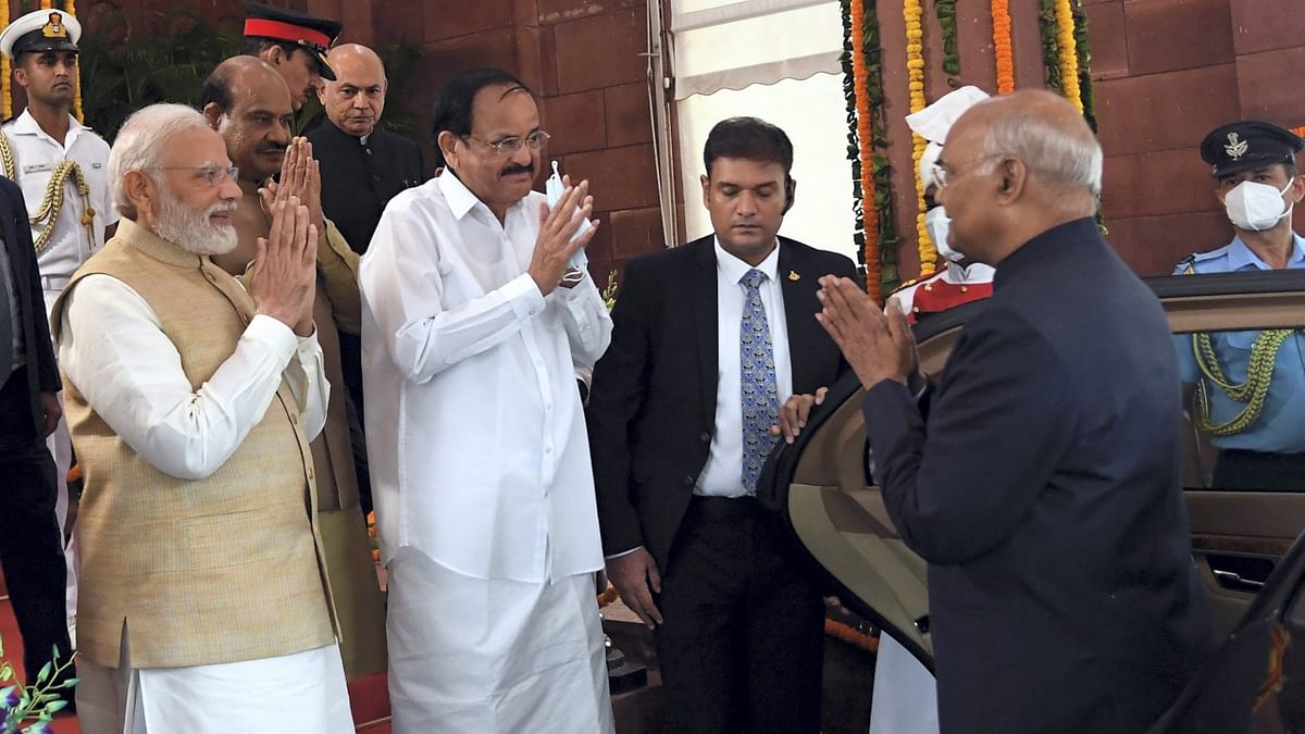 Vice President M Venkaiah Naidu, Prime Minister Narendra Modi and Lok Sabha Speaker Om Birla greet the outgoing President Ram Nath Kovind at Parliament House in New Delhi. Credit: PTI Photo
