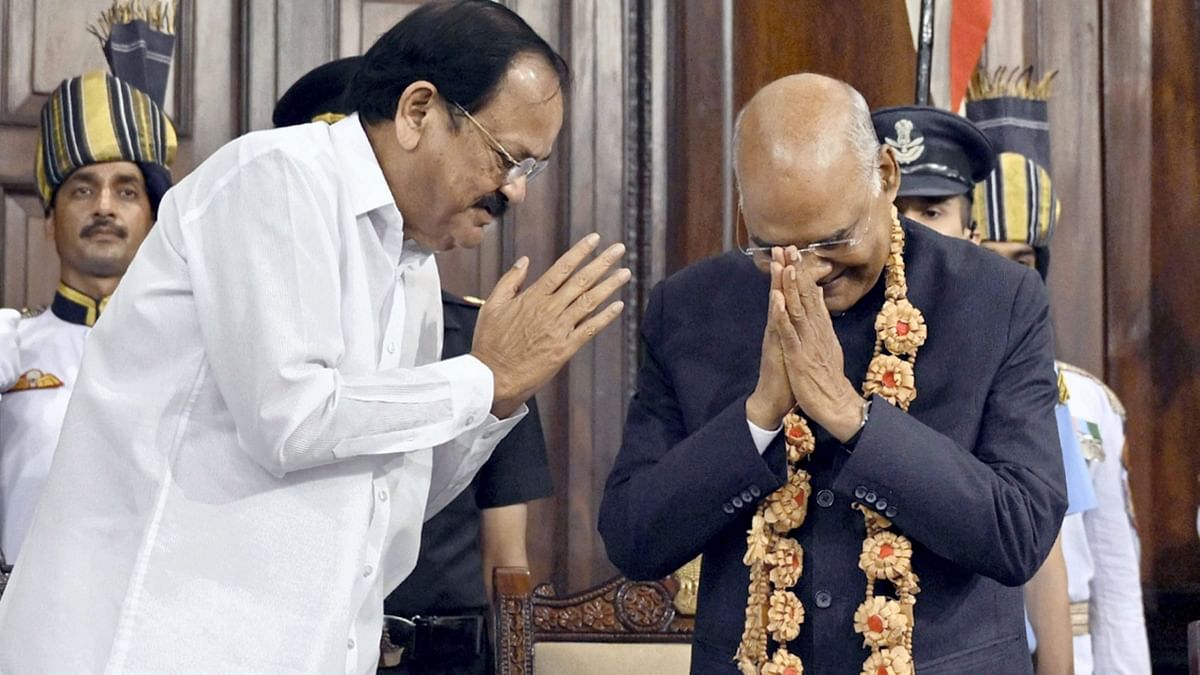 Vice President M Venkaiah Naidu greets Ram Nath Kovind at the latter's farewell ceremony at Parliament House, in New Delhi. Credit: PTI Photo