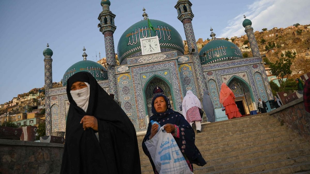 Women from the Shi'ite community leave the Sakhi Shah-e Mardan Shrine and mosque in Kabul. Credit: AFP Photo