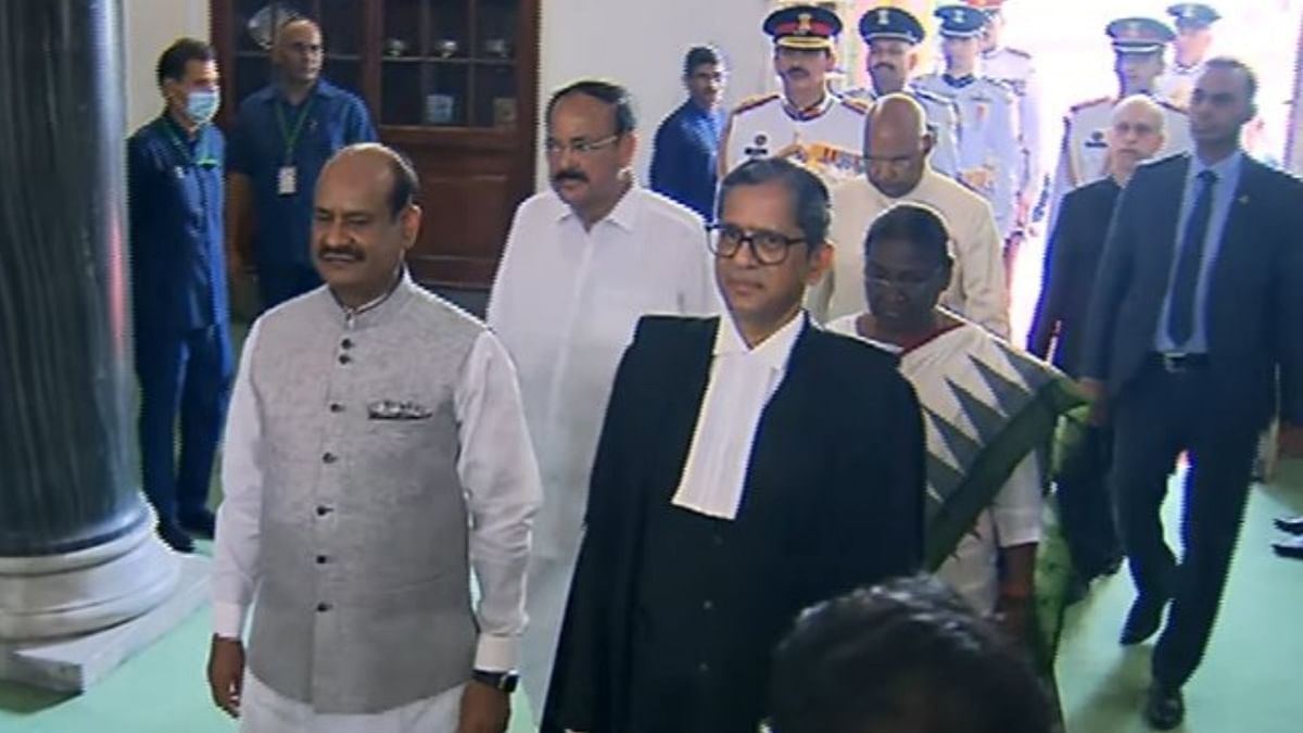 Accompanying them were Chief Justice of India N V Ramana, the Chairman of the Rajya Sabha M Venkaiah Naidu, and Lok Sabha Speaker Om Birla. Credit: Sansad TV