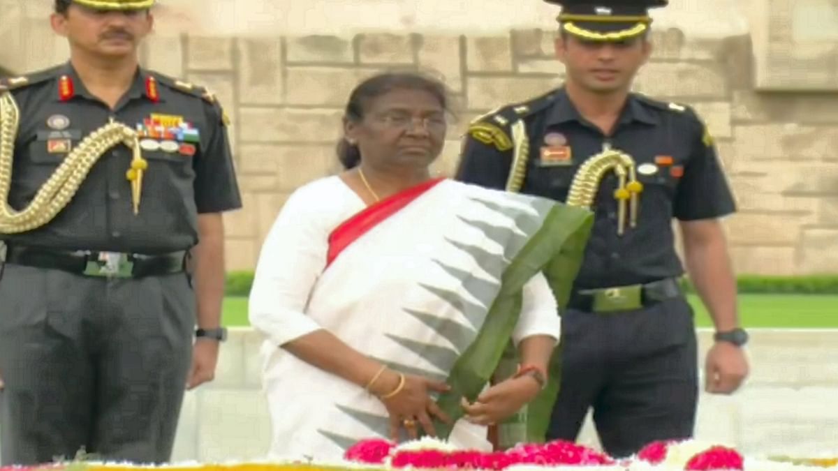 President-elect Droupadi Murmu began her day by visiting Raj Ghat and paying floral tributes at the memorial of Mahatma Gandhi, ahead of her swearing-in ceremony. Credit: PTI Photo