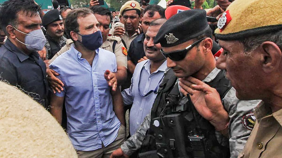 Former Congress president Rahul Gandhi and several party MPs were detained by Delhi police at Vijay Chowk after they staged a protest against the ED questioning Sonia Gandhi. Credit: PTI Photo