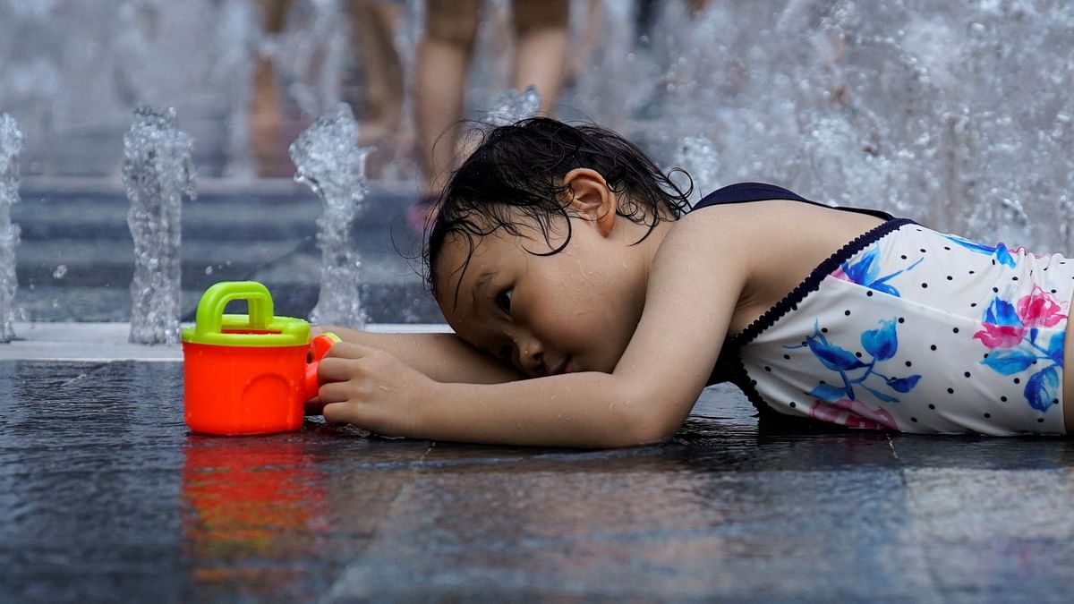 China is no exception and is sweating through one of its hottest summers on record. Credit: Reuters Photo
