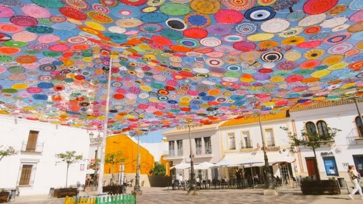 Local women of Cartaya, Spain have created a crocheted canopy for shade from the scorching sunlight in public spaces. Credit: Twitter/womensart1