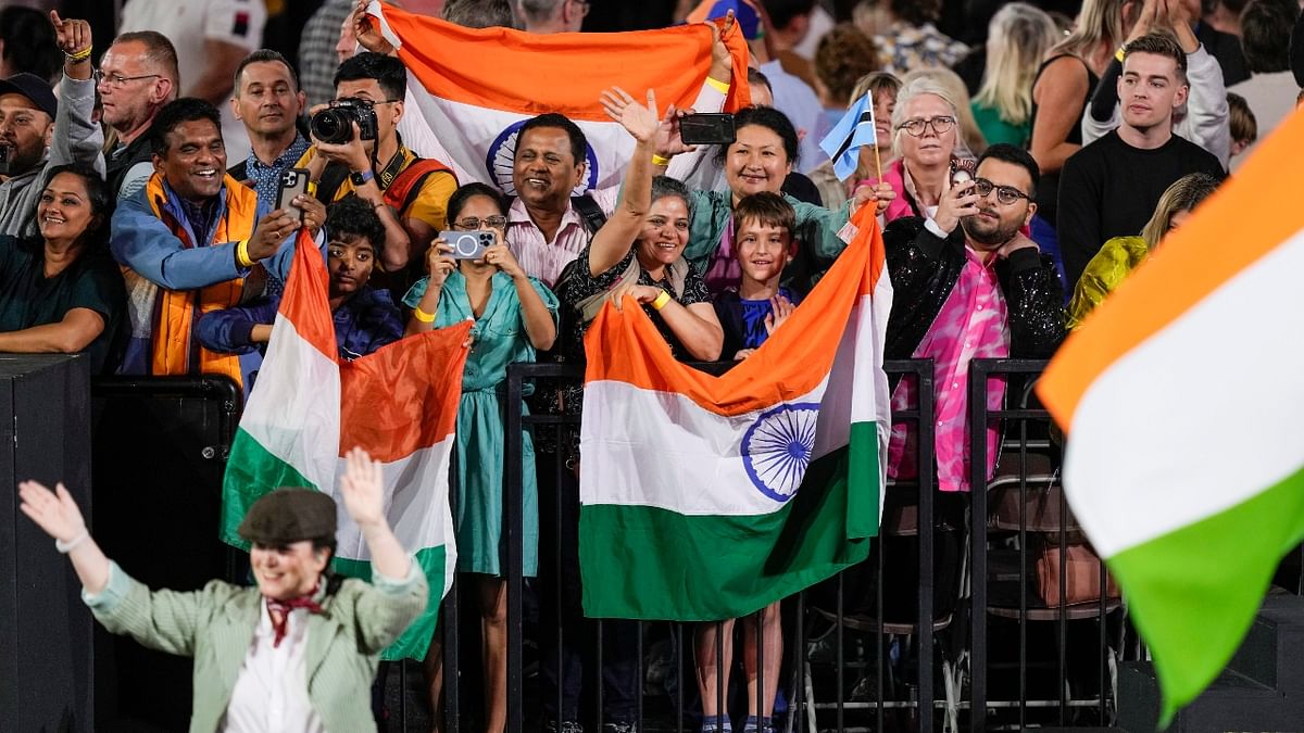 Indian team's supporters watch the Commonwealth Games opening ceremony at the Alexander Stadium in Birmingham, England. Credit: AP Photo