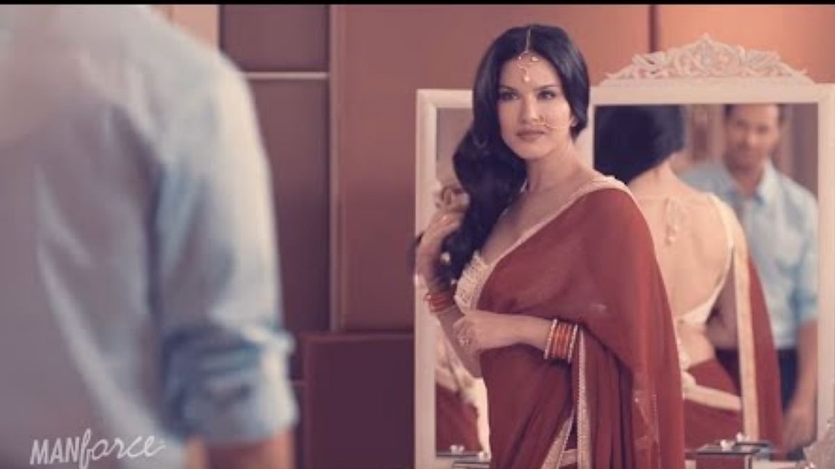 Adult star turned actor Sunny Leone had associated with a condom brand. She was seen playing basketball with a man in the commercial. Credit: Manforce