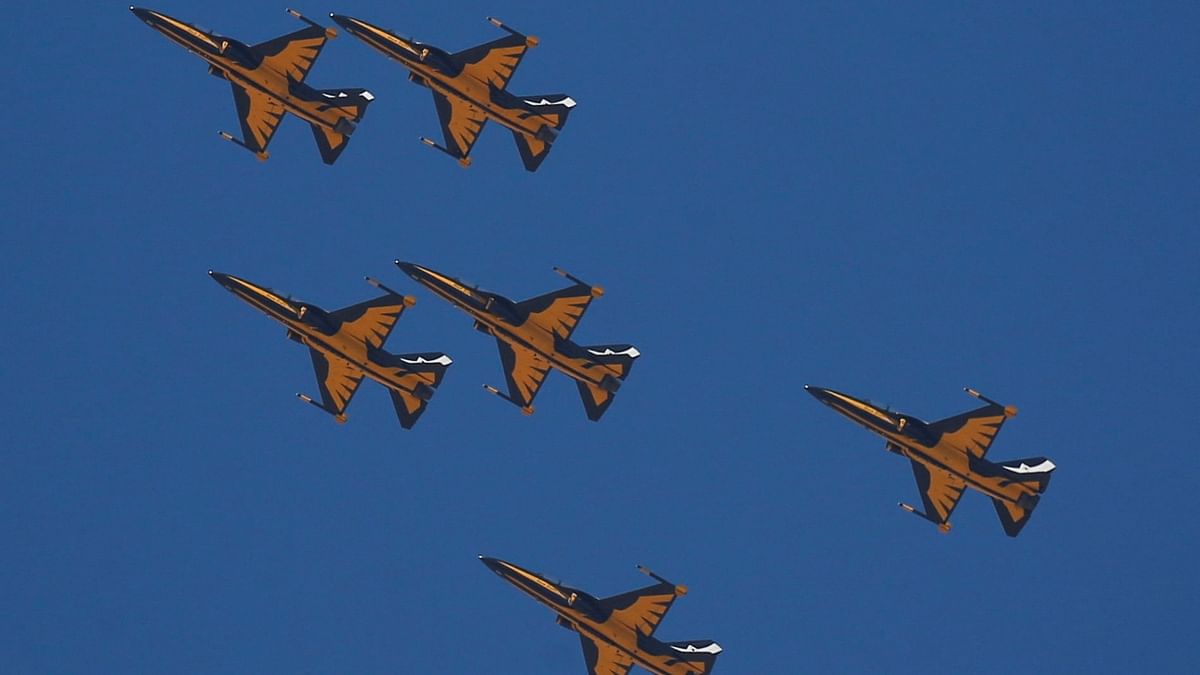 South Korea's Black Eagles aerobatics team performs the Taegeuk maneuver during Pyramids Air Show 2022 over the Pyramids Plateau in Giza, Egypt. Credit: Reuters Photo