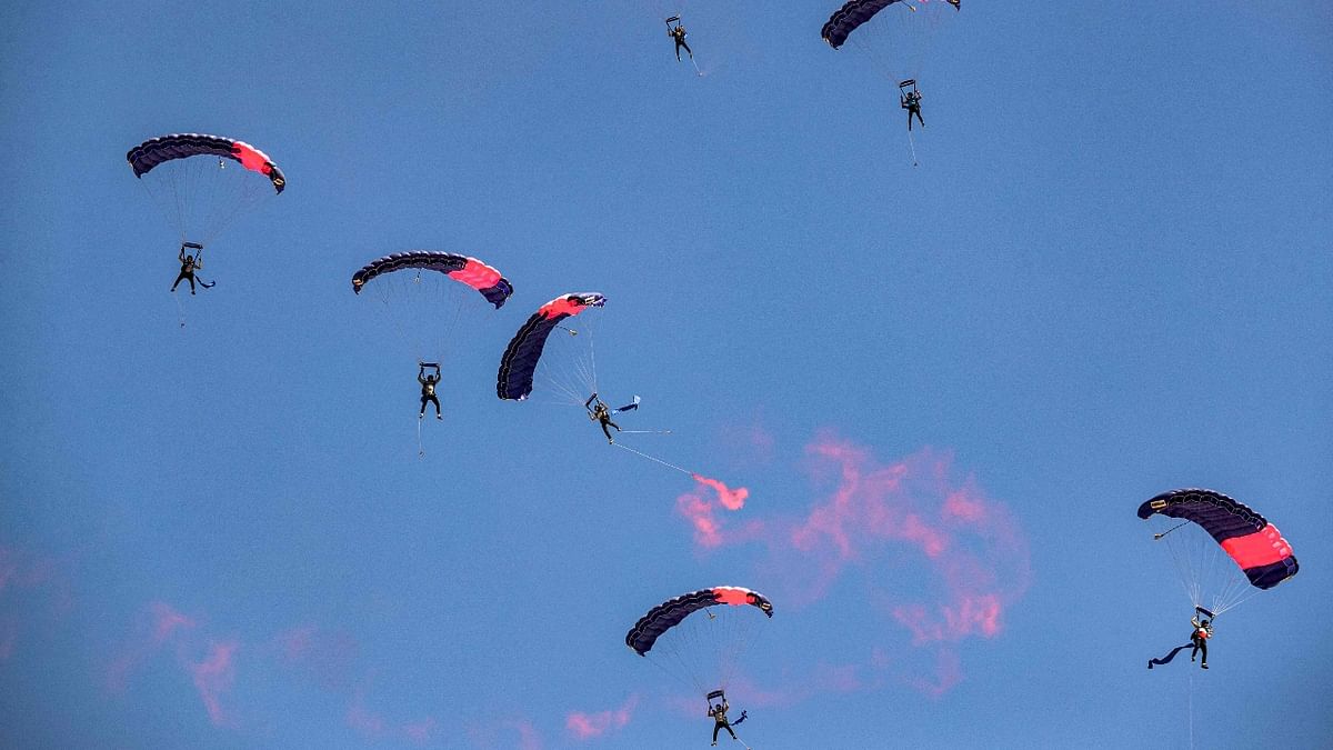 Parachutists drop during the Pyramids Air Show 2022 at the Giza Pyramids Necropolis on the southwestern outskirts of Egypt. Credit: AFP Photo