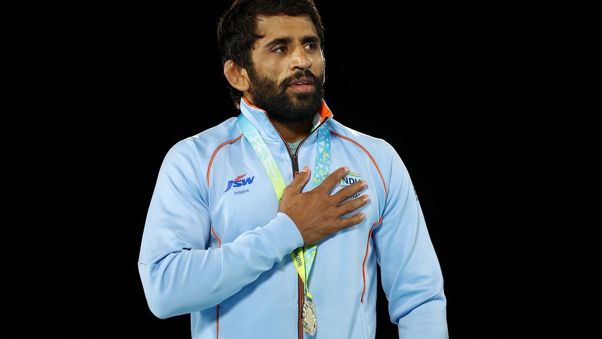 Star Indian wrestler Bajrang Punia was a class apart while defending his title as he conceded just two points en route to the gold medal show at the 2022 Commonwealth Games. Credit: Reuters Photo