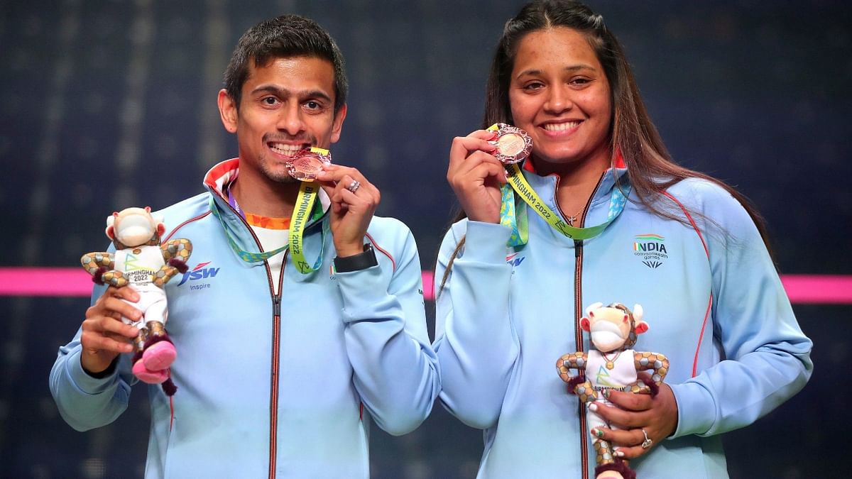 Star mixed doubles pair of Saurav Ghosal and Dipika Pallikal won the bronze to secure India's second medal in squash at the Commonwealth Games. Credit: AP Photo