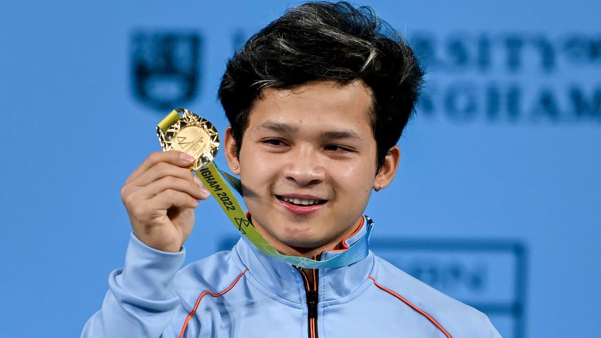 Young weightlifter Jeremy Lalrinnunga came up with a courageous display to grab the gold in men's 67 kg division at the Commonwealth Games 2022. Credit: PTI Photo